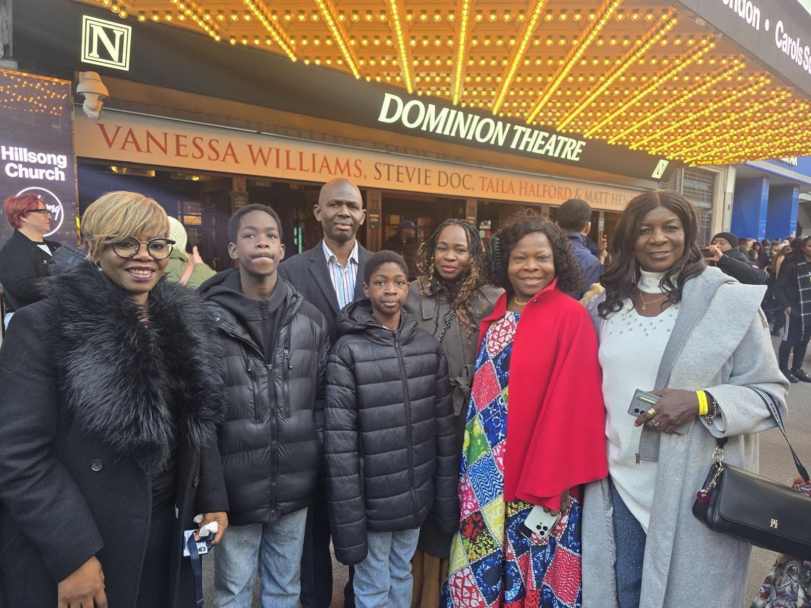 Members and their families gathered outside the Dominion Theatre