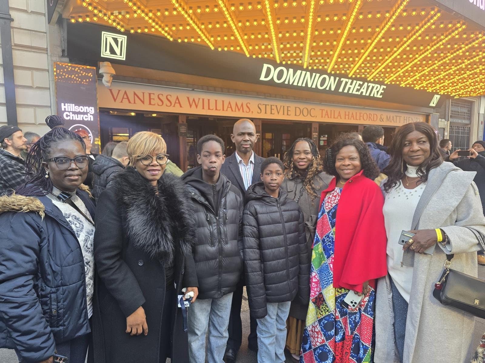 Members, children and friends outside the Dominion Theatre